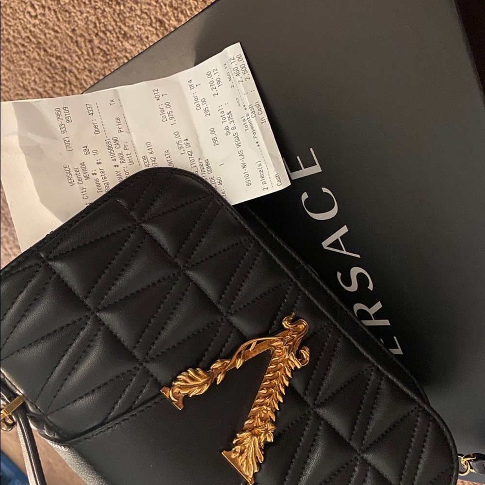 Versace Purse gold and black Comes with receipt very classy